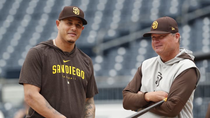 Shildt (right) has helped institute a successful 1980s-style hitting approach in San Diego.