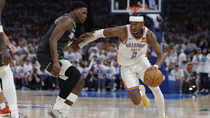 Oklahoma City Thunder guard Shai Gilgeous-Alexander drives against Minnesota Timberwolves guard Anthony Edward in the fourth quarter during game one of the western conference finals for the 2025 NBA Playoffs at Paycom Center. Oklahoma City Thunder guard Shai Gilgeous-Alexander drives against Minnesota Timberwolves guard Anthony Edward in the fourth quarter during game one of the western conference finals for the 2025 NBA Playoffs at Paycom Center.