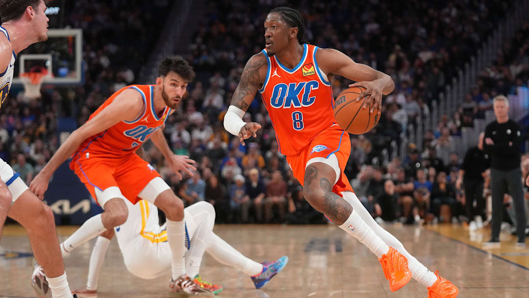 Dec 2, 2025; San Francisco, California, USA; Oklahoma City Thunder guard Jalen Williams (8) dribbles the ball against the Golden State Warriors in the fourth quarter at the Chase Center.