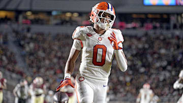 Oct 5, 2024; Tallahassee, Florida, USA; Clemson Tigers wide receiver Antonio Williams (0) scores a touchdown against the Florida State Seminoles during the first half at Doak S. Campbell Stadium. Mandatory Credit: Melina Myers-Imagn Images