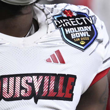 Dec 27, 2023; San Diego, CA, USA; A detailed view of a Louisville Cardinals player wearing a Holiday Bowl patch during the second half against the USC Trojans at Petco Park. 