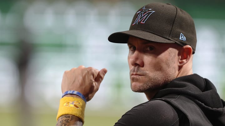Sep 10, 2024; Pittsburgh, Pennsylvania, USA; Miami Marlins manager Skip Schumaker (45) looks on from the dugout against the Pittsburgh Pirates during the fifth inning at PNC Park. Mandatory Credit: Charles LeClaire-Imagn Images
