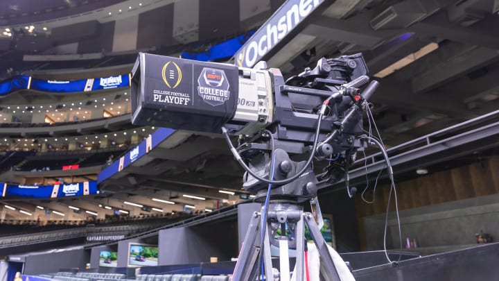 Jan 1, 2024; New Orleans, LA, USA; A general view of an ESPN television camera with the College Football Playoff logo before the 2024 Sugar Bowl college football playoff semifinal game between the Texas Longhorns and the Washington Huskies at Caesars Superdome. Mandatory Credit: Stephen Lew-USA TODAY Sports