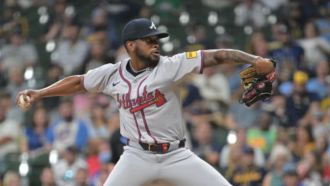 Jul 29, 2024; Milwaukee, Wisconsin, USA; Atlanta Braves relief pitcher Darius Vines (61) delivers a pitch against the Milwaukee Brewers in the eight inning at American Family Field. Mandatory Credit: Michael McLoone-Imagn Images