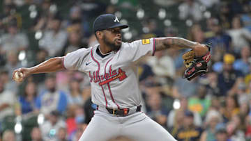 Jul 29, 2024; Milwaukee, Wisconsin, USA; Atlanta Braves relief pitcher Darius Vines (61) delivers a pitch against the Milwaukee Brewers in the eight inning at American Family Field. Mandatory Credit: Michael McLoone-Imagn Images