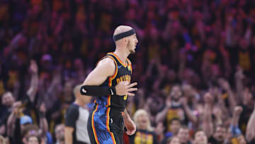 May 5, 2025; Oklahoma City, Oklahoma, USA; Oklahoma City Thunder guard Alex Caruso (9) reacts after scoring a three-point basket against the Denver Nuggets during the second quarter during game one of the second round for the 2025 NBA Playoffs at Paycom Center. Mandatory Credit: Alonzo Adams-Imagn Images