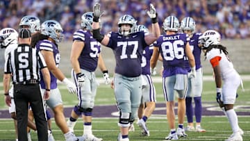 Aug 31, 2024; Manhattan, Kansas, USA; Kansas State Wildcats offensive lineman Carver Willis (77) celebrates a field goal during the third quarter against the Tennessee-Martin Skyhawks at Bill Snyder Family Football Stadium. Mandatory Credit: Scott Sewell-Imagn Images