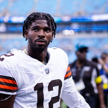 Aug 8, 2025; Charlotte, North Carolina, USA; August 8, 2025: Cleveland Browns quarterback Shedeur Sanders (12) walks off before the game against the Carolina Panthers at Bank of America Stadium.