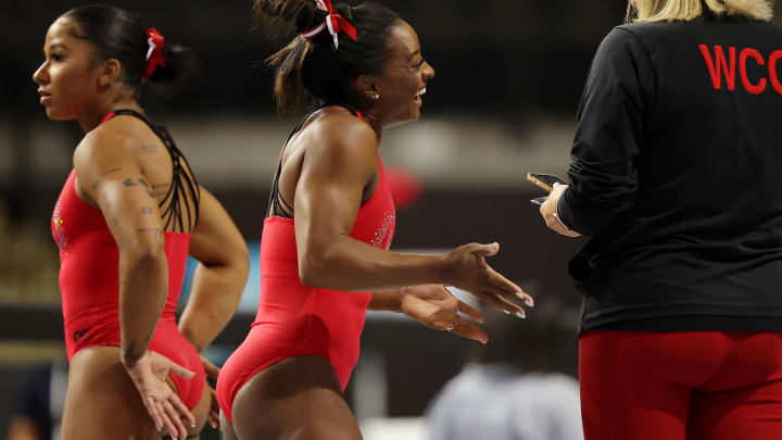 Aug 4, 2023; Hoffman Estates, Illinois, USA; Simone Biles laughs during podium training before the Core Hydration Classic at NOW Arena. 