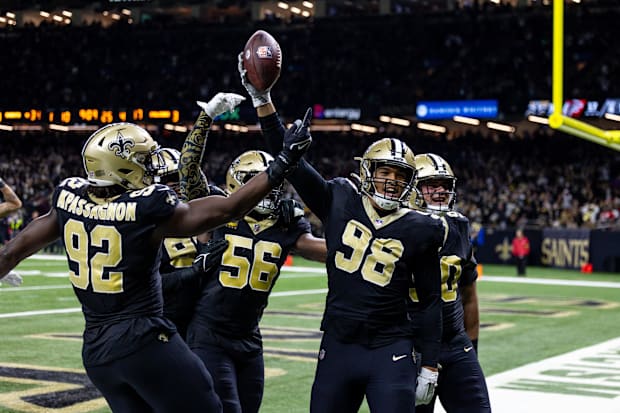 New Orleans Saints defensive end Payton Turner reacts to recovering a fumble against the Atlanta Falcons.