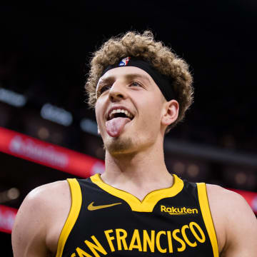 Nov 14, 2023; San Francisco, California, USA; Golden State Warriors guard Brandin Podziemski (2) reacts after hitting a three-point shot against the Minnesota Timberwolves during the second half at Chase Center. Mandatory Credit: John Hefti-USA TODAY Sports