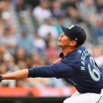  Seattle Mariners starting pitcher Emerson Hancock (62) catches a fly ball against the Chicago White Sox during the fourth inning at T-Mobile Park on June 13.