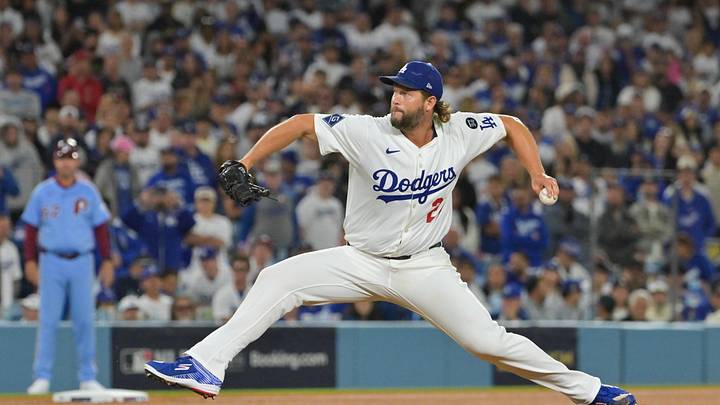 Oct 8, 2025; Los Angeles, California, USA; Los Angeles Dodgers pitcher Clayton Kershaw (22) pitches during the seventh inning against the Philadelphia Phillies during game three of the NLDS round for the 2025 MLB playoffs at Dodger Stadium. Mandatory Credit: Jayne Kamin-Oncea-Imagn Images