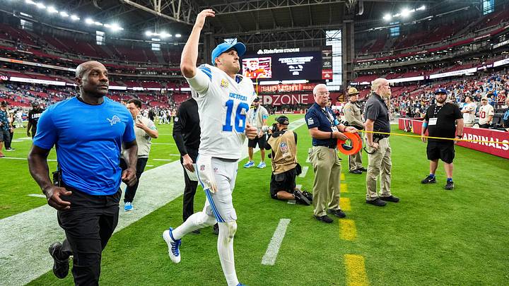 Detroit Lions quarterback Jared Goff (16) waves at fans to celebrate 45-21 win over Arizona Cardinals at State Farm Stadium in Glendale, Arizona on Sunday, Oct. 11, 2026.