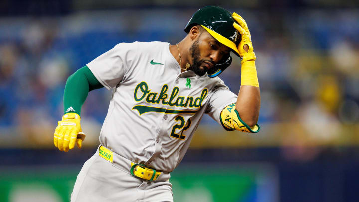 May 28, 2024; St. Petersburg, Florida, USA;  Oakland Athletics outfielder Miguel Andujar (22) runs the bases after hitting a three-run home run against the Tampa Bay Rays in the sixth inning  at Tropicana Field. Mandatory Credit: Nathan Ray Seebeck-USA TODAY Sports