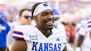 Nov 8, 2025; Tucson, Arizona, USA; Kansas Jayhawks quarterback Jalon Daniels (6) against the Arizona Wildcats at Arizona Stadium. Mandatory Credit: Mark J. Rebilas-Imagn Images