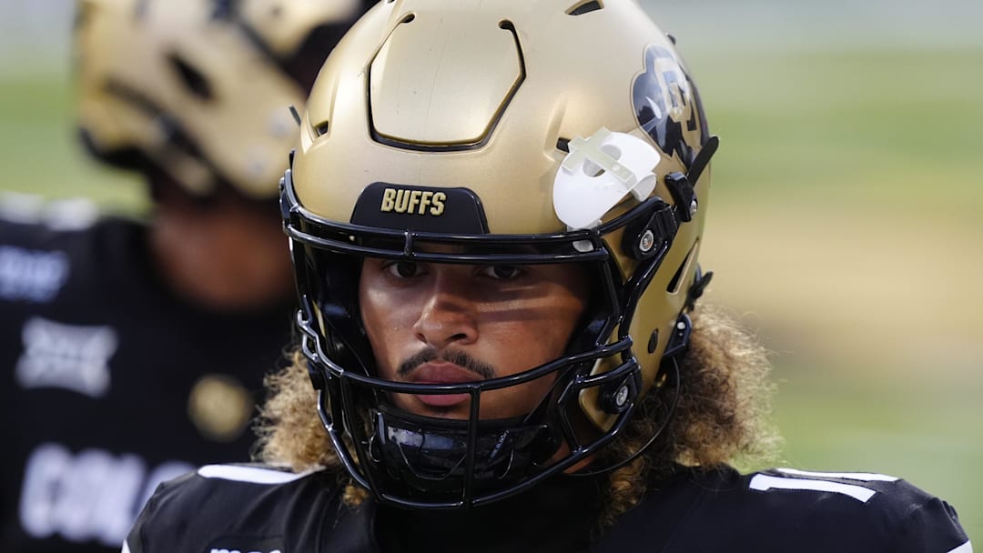 Aug 29, 2025; Boulder, Colorado, USA; Colorado Buffaloes quarterback Julian Lewis (10) warms up in the second quarter against the Georgia Tech Yellow Jackets at Folsom Field. Mandatory Credit: Ron Chenoy-Imagn Images