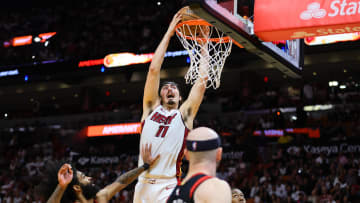 Apr 19, 2024; Miami, Florida, USA; Miami Heat guard Jaime Jaquez Jr. (11) dunks the basketball against the Chicago Bulls in the fourth quarter during a play-in game of the 2024 NBA playoffs at Kaseya Center. Mandatory Credit: Sam Navarro-USA TODAY Sports