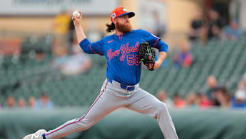 Feb 26, 2025; Jupiter, Florida, USA; New York Mets starting pitcher Paul Blackburn (58) delivers a pitch against the Miami Marlins during the first inning at Roger Dean Chevrolet Stadium. Mandatory Credit: Sam Navarro-Imagn Images