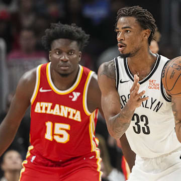 Oct 23, 2024; Atlanta, Georgia, USA; Brooklyn Nets center Nic Claxton (33) handles the ball against the Atlanta Hawks during the second half at State Farm Arena. Mandatory Credit: Dale Zanine-Imagn Images