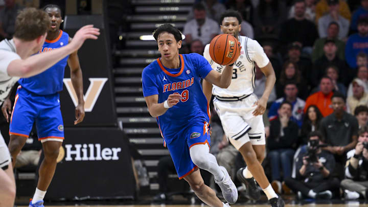 Jan 17, 2026; Nashville, Tennessee, USA;  Florida Gators guard Xaivian Lee (99) brings the ball up court against the Vanderbilt Commodores during the first half at Memorial Gymnasium. Mandatory Credit: Steve Roberts-Imagn Images