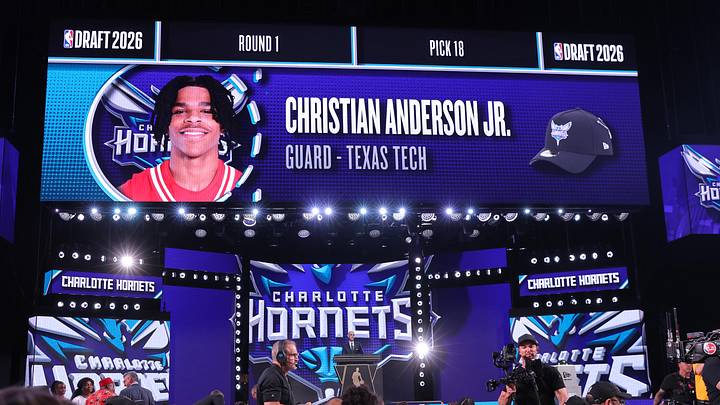Jun 23, 2026; New York, NY, USA; NBA commissioner Adam Silver greets the eighteenth pick in the 2026 NBA draft, Texas Tech guard Christian Anderson Jr. after he was selected by the Charlotte Hornets at Barclays Center. Mandatory Credit: Brad Penner-Imagn Images