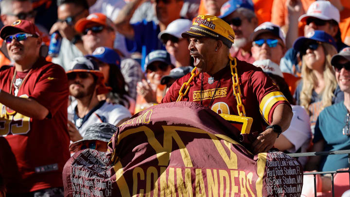 Sep 17, 2023; Denver, Colorado, USA; Washington Commanders super fan Stephen Boyd cheers in the third quarter against the Denver Broncos at Empower Field at Mile High. Mandatory Credit: Isaiah J. Downing-USA TODAY Sports