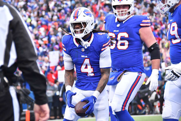 Buffalo Bills running back James Cook celebrates a touchdown during the second quarter against the Denver Broncos