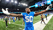Detroit Lions linebacker Mitchell Agude (50) celebrates 34-31 win over Green Bay Packers