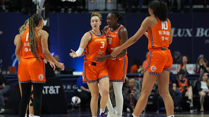 Jun 15, 2025; Uncasville, Connecticut, USA; Connecticut Sun guard Marina Mabrey (3) and center Tina Charles (31) react after a play against the Chicago Sky in the first half at Mohegan Sun Arena. Mandatory Credit: David Butler II-Imagn Images