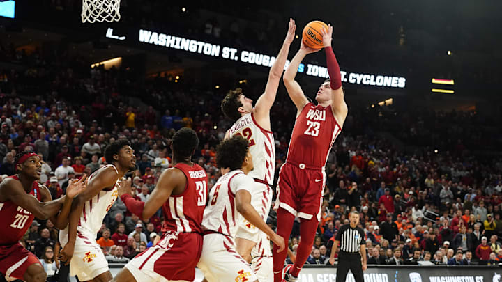 Mar 23, 2024; Omaha, NE, USA; Washington State Cougars forward Andrej Jakimovski (23) shoots the ball during the first half against Iowa State Cyclones in the second round of the 2024 NCAA Tournament at CHI Health Center Omaha. Mandatory Credit: Dylan Widger-Imagn Images