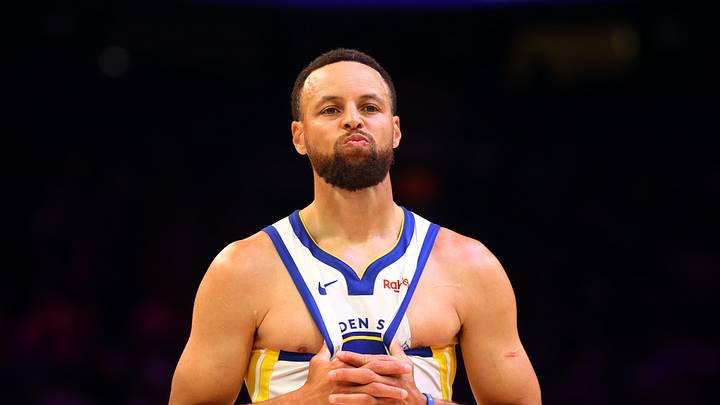 Phoenix, Arizona, USA; Golden State Warriors guard Stephen Curry (30) reacts against the Phoenix Suns during the second half in the play-in rounds of the 2026 NBA Playoffs at Mortgage Matchup Center. Mandatory Credit: Mark J. Rebilas-Imagn Images