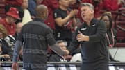 Feb 26, 2025; Stanford, California, USA;  Boston College Eagles head coach Earl Grant (left) shakes hands with Stanford Cardinal head coach Kyle Smith after the game at Maples Pavilion. Mandatory Credit: Stan Szeto-Imagn Images