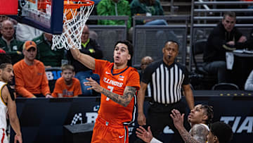Mar 14, 2025; Indianapolis, IN, USA; Illinois Fighting Illini forward Will Riley (7) shoots the ball while Maryland Terrapins guard DeShawn Harris-Smith (5) defends in the first half  at Gainbridge Fieldhouse. Mandatory Credit: Trevor Ruszkowski-Imagn Images