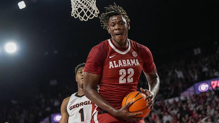 Mar 3, 2026; Athens, Georgia, USA; Alabama Crimson Tide forward Aiden Sherrell (22) grabs a rebound against the Georgia Bulldogs at Stegeman Coliseum. Mandatory Credit: Dale Zanine-Imagn Images