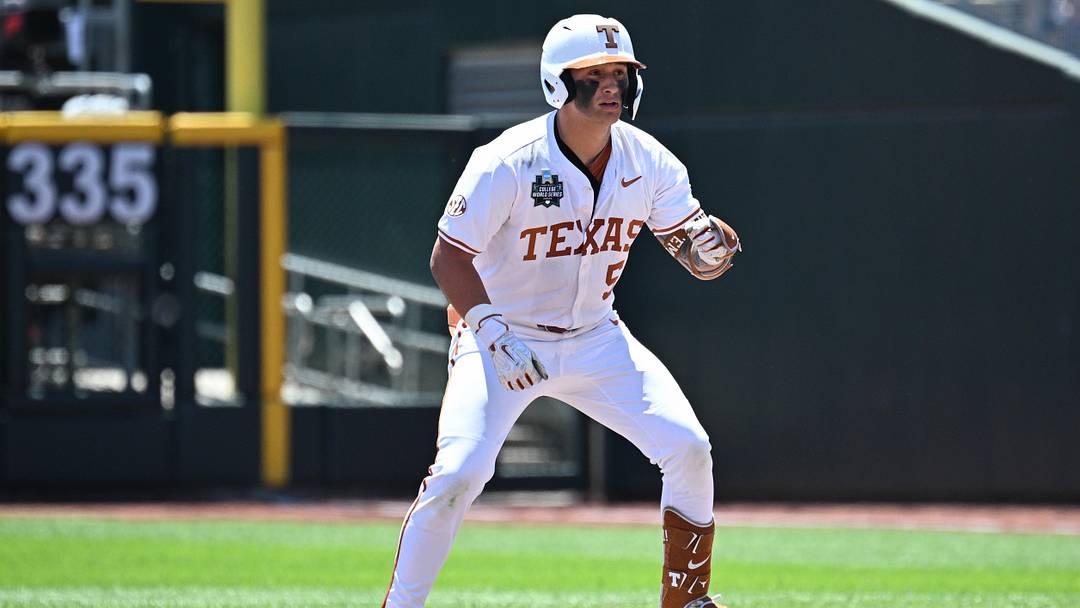 Texas Longhorns infielder Ethan Mendoza at second base after a double against the Alabama Crimson Tide in the Men's College World Series. Texas Longhorns infielder Ethan Mendoza at second base after a double against the Alabama Crimson Tide in the Men's College World Series.
