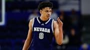 Feb 4, 2025; Colorado Springs, Colorado, USA; Nevada Wolf Pack guard Kobe Sanders (8) gestures in the second half against the Air Force Falcons at Clune Arena. Mandatory Credit: Isaiah J. Downing-Imagn Images