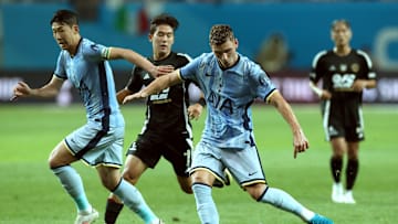 Donley in action for Spurs during the pre-season tour of Asia