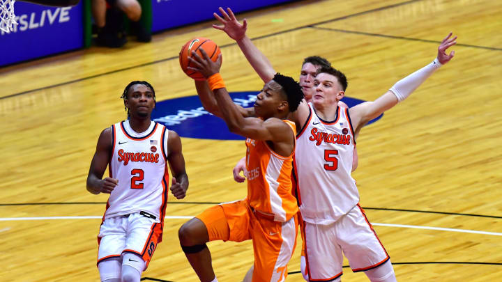 Nov 20, 2023; Honolulu, Hawaii, USA;  

Tennessee Volunteers guard Jordan Gainey (2) drives to the basket defended by Syracuse Orange guard JJ Starling (2) and guard Justin Taylor (5) during the first period at SimpliFi Arena at Stan Sheriff Center. Mandatory Credit: Steven Erler-USA TODAY Sports