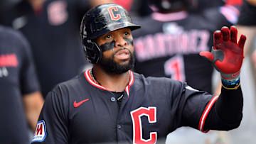 Jul 12, 2025; Chicago, Illinois, USA; Cleveland Guardians first baseman Carlos Santana (41) celebrates in the dugout with teammates after scoring during the fourth inning against the Chicago White Sox at Rate Field. Mandatory Credit: Patrick Gorski-Imagn Images