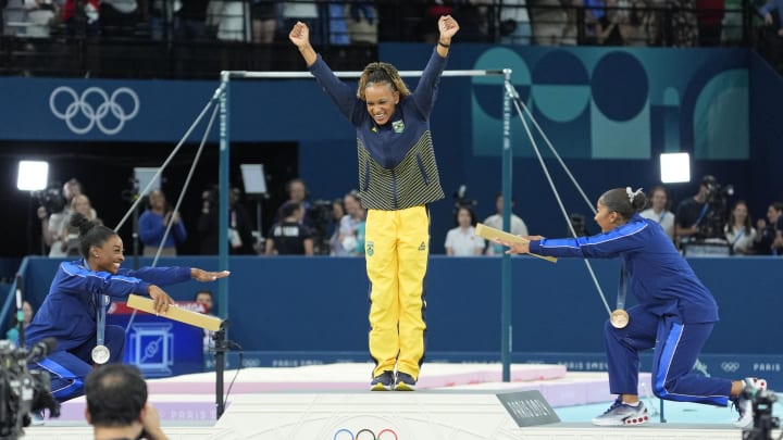 Aug 5, 2024: Simone Biles and Jordan Chiles bow to gold medalist Rebeca Andrade of Brazil on the floor exercise on day three of the gymnastics event finals during the Paris 2024 Olympic Summer Games.