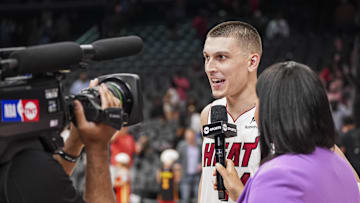 Apr 18, 2025; Atlanta, Georgia, USA; Miami Heat guard Tyler Herro (14) is interviewed after the Heat defeated the Atlanta Hawks in overtime at State Farm Arena. Mandatory Credit: Dale Zanine-Imagn Images