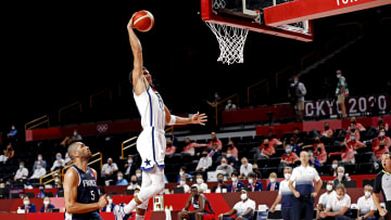 Aug 7, 2021; Saitama, Japan; United States small forward Jayson Tatum (10) dunks the ball against France in the Olympics.