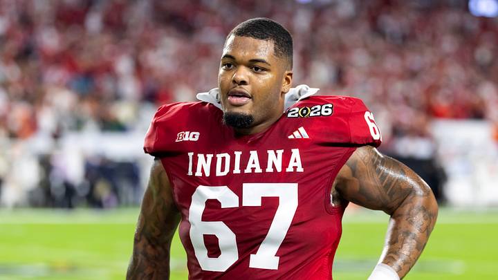 Jan 19, 2026; Miami Gardens, FL, USA; Indiana Hoosiers offensive lineman Kahlil Benson (67) against the Miami Hurricanes in the College Football Playoff National Championship game at Hard Rock Stadium. Mandatory Credit: Mark J. Rebilas-Imagn Images