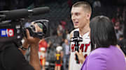 Apr 18, 2025; Atlanta, Georgia, USA; Miami Heat guard Tyler Herro (14) is interviewed after the Heat defeated the Atlanta Hawks in overtime at State Farm Arena. Mandatory Credit: Dale Zanine-Imagn Images