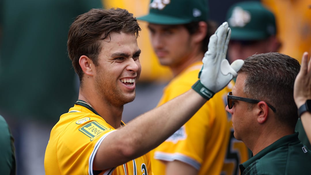 Jul 2, 2025; Tampa, Florida, USA; Athletics third baseman Max Muncy (10) reacts after hitting a home run against the Tampa Bay Rays in the ninth inning at George M. Steinbrenner Field. Mandatory Credit: Nathan Ray Seebeck-Imagn Images