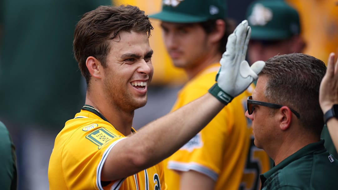 Jul 2, 2025; Tampa, Florida, USA; Athletics third baseman Max Muncy (10) reacts after hitting a home run against the Tampa Bay Rays in the ninth inning at George M. Steinbrenner Field. Mandatory Credit: Nathan Ray Seebeck-Imagn Images