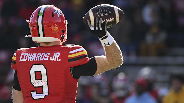 Nov 23, 2024; College Park, Maryland, USA; Wisconsin Badgers quarterback Billy Edwards Jr. (9) throws from the pocket for the Maryland Terrapins during the first half against the Iowa Hawkeyes at SECU Stadium. Nov 23, 2024; College Park, Maryland, USA; Wisconsin Badgers quarterback Billy Edwards Jr. (9) throws from the pocket for the Maryland Terrapins during the first half against the Iowa Hawkeyes at SECU Stadium.