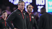 Dec 3, 2024; Athens, Georgia, USA; Georgia Bulldogs head coach Mike White on the bench during the game against the Notre Dame Fighting Irish during the first half at Stegeman Coliseum. Mandatory Credit: Dale Zanine-Imagn Images