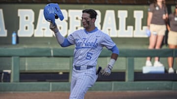 May 31, 2024; Chapel Hill, NC, USA; North Carolina infielder Gavin Gallaher (5) celebrates his home run against the LIU Sharks during the NCAA regional in Chapel Hill, NC. Mandatory Credit: Jim Dedmon-Imagn Images